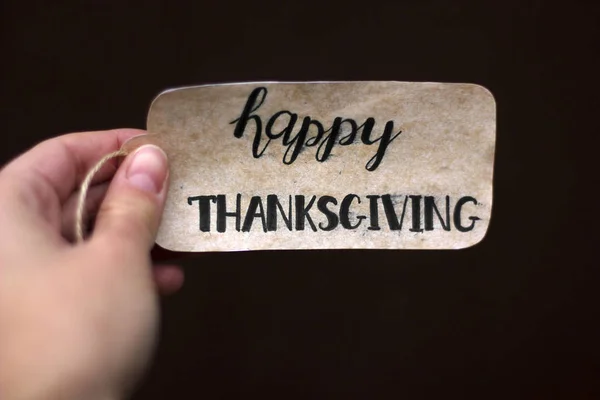 Die Inschrift "Happy Thanksgiving" in der Hand — Stockfoto