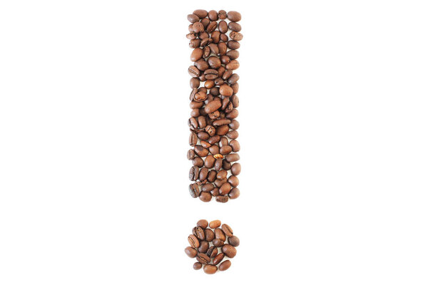 Coffee beans. Exclamation mark made from coffee beans on a white background. brown