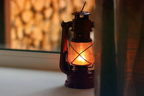 Kerosene lamp on the window. Old lamp — Stock Photo, Image