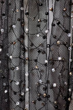 Parlak renklerin payetleri ve payetleri ile kumaş. Moda glitter kumaş, payetler. Parlak yüzey