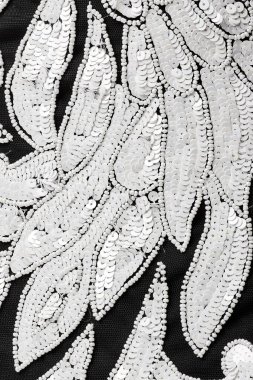 Parlak renklerin payetleri ve payetleri ile kumaş. Moda glitter kumaş, payetler. Parlak yüzey