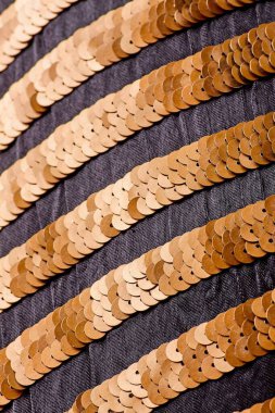 Parlak renklerin payetleri ve payetleri ile kumaş. Moda glitter kumaş, payetler. Parlak yüzey