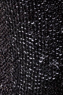 Parlak renklerin payetleri ve payetleri ile kumaş. Moda glitter kumaş, payetler. Parlak yüzey