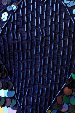 Parlak renklerin payetleri ve payetleri ile kumaş. Moda glitter kumaş, payetler. Parlak yüzey