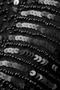 Parlak renklerin payetleri ve payetleri ile kumaş. Moda glitter kumaş, payetler. Parlak yüzey