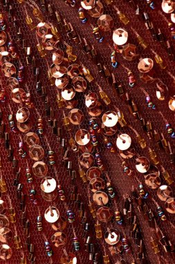 Parlak renklerin payetleri ve payetleri ile kumaş. Moda glitter kumaş, payetler. Parlak yüzey