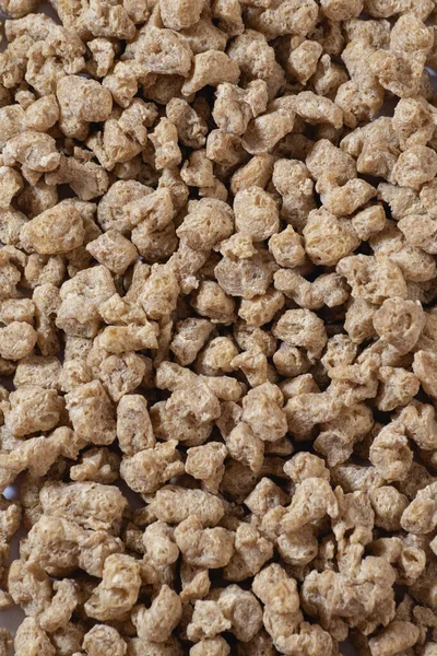 Dried soy protein (vegan meat) texture.