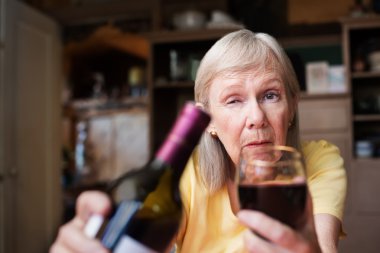 Drunk woman offering a glass of wine clipart