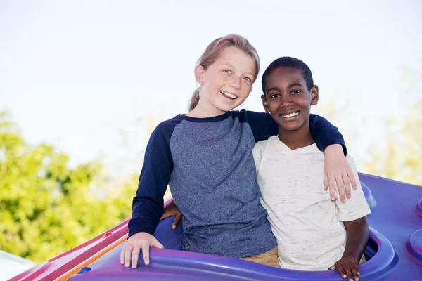 Laughing brothers embracing outside — Stock Photo, Image