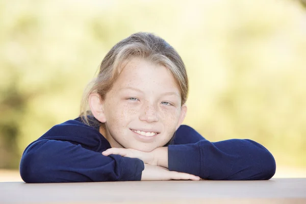 Smiling boy with freckles outside — Stock Photo, Image