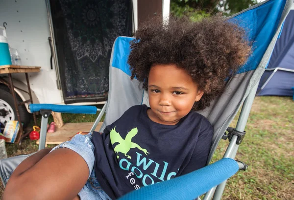 Girl in Chair at the Wild Goose Festival — Stock Photo, Image