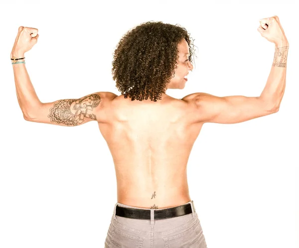 Fuerte mujer afroamericana desde atrás sin camisa sonriendo —  Fotos de Stock