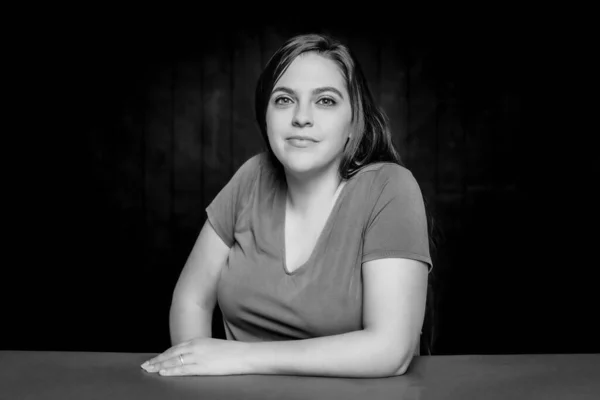 Black White Portrait Smiling Young Woman Her Arm Table — Stock Photo, Image