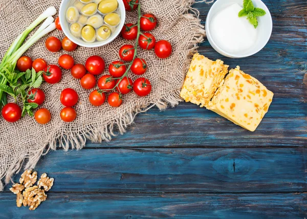 Some Red Fresh Cherries Spring Onions Coriander Cheese Garlic Olives — Stock Photo, Image