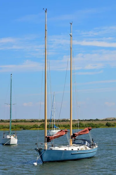 Sailboats moored on river — Stock Photo, Image