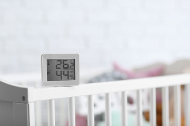 Digital temperature and humidity control on cot  clipart