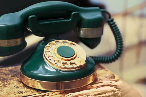 Vintage telephone with old book, close up — Stock Photo, Image