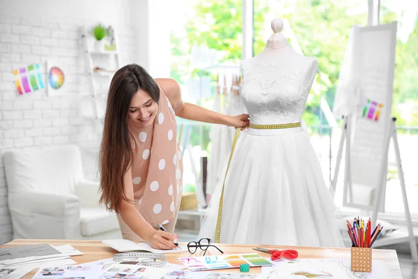 Pretty young dressmaker — Stock Photo, Image