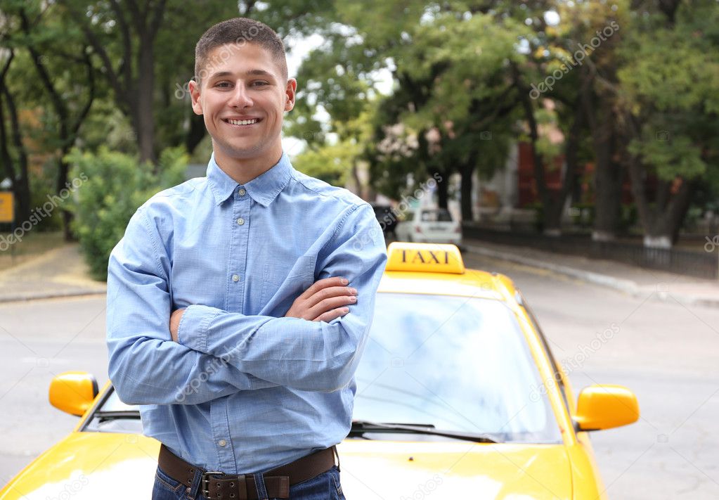 Taxi Driver Near Car Stock Photo Belchonock 124917326 taxi-driver-near-car-stock-photo-belchonock-124917326