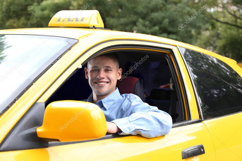 taxi driver near car