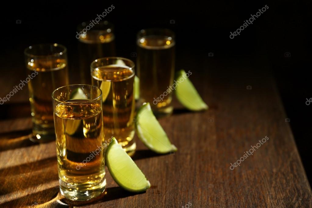 Gold tequila shots Stock Photo by ©belchonock 125026638
