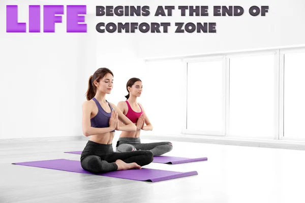 Comfort zone concept, Young women doing yoga in gym