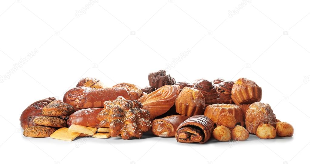 Assortment of sweet tasty pastries isolated on white