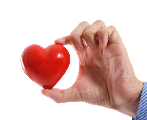 Manlig hand med rött hjärta på vit bakgrund — Stockfoto