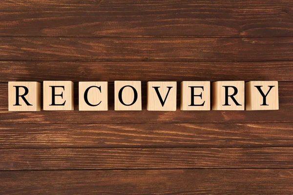 Word Recovery gemaakt van kubussen — Stockfoto