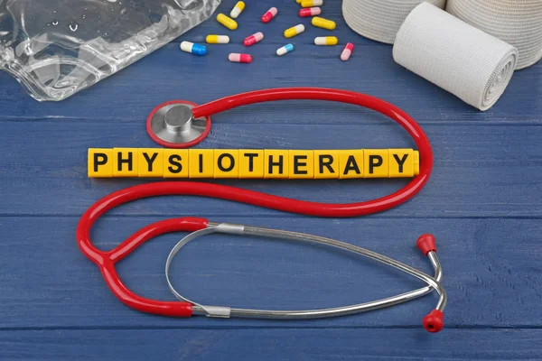 Medical equipment and word Physiotherapy — Stock Photo, Image