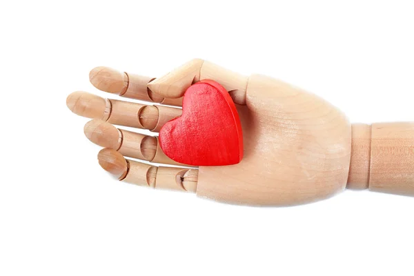 Деревянная рука с красным сердцем — стоковое фото