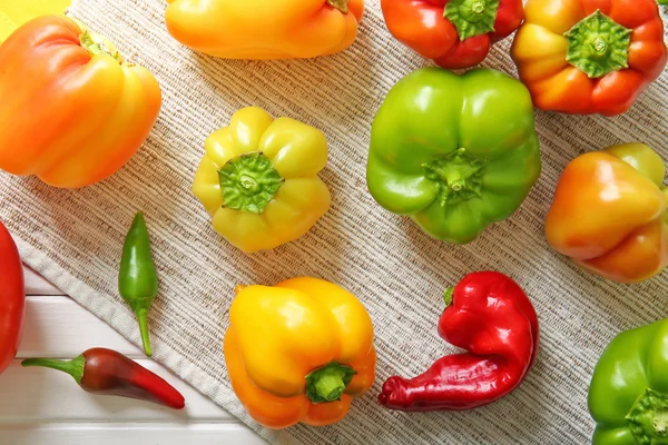 Fresh peppers on table — Stock Photo, Image