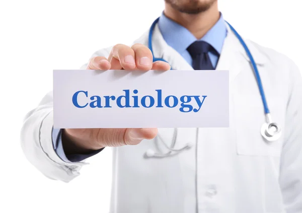 Dokter houden van papier met de tekst van de cardiologie — Stockfoto