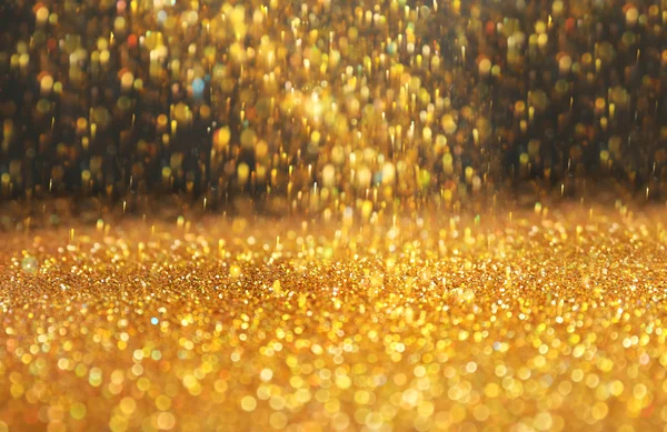 Lesklé zlaté jiskry — Stock fotografie