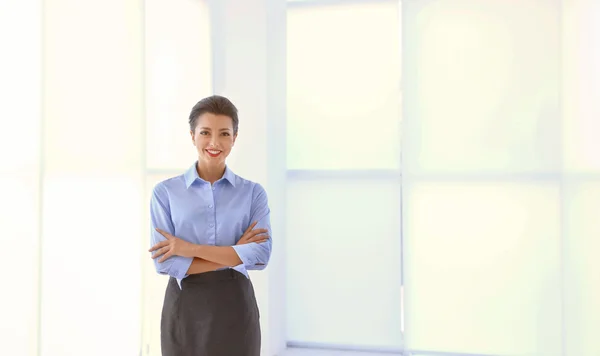 Beautiful businesswoman on light background — Stock Photo, Image