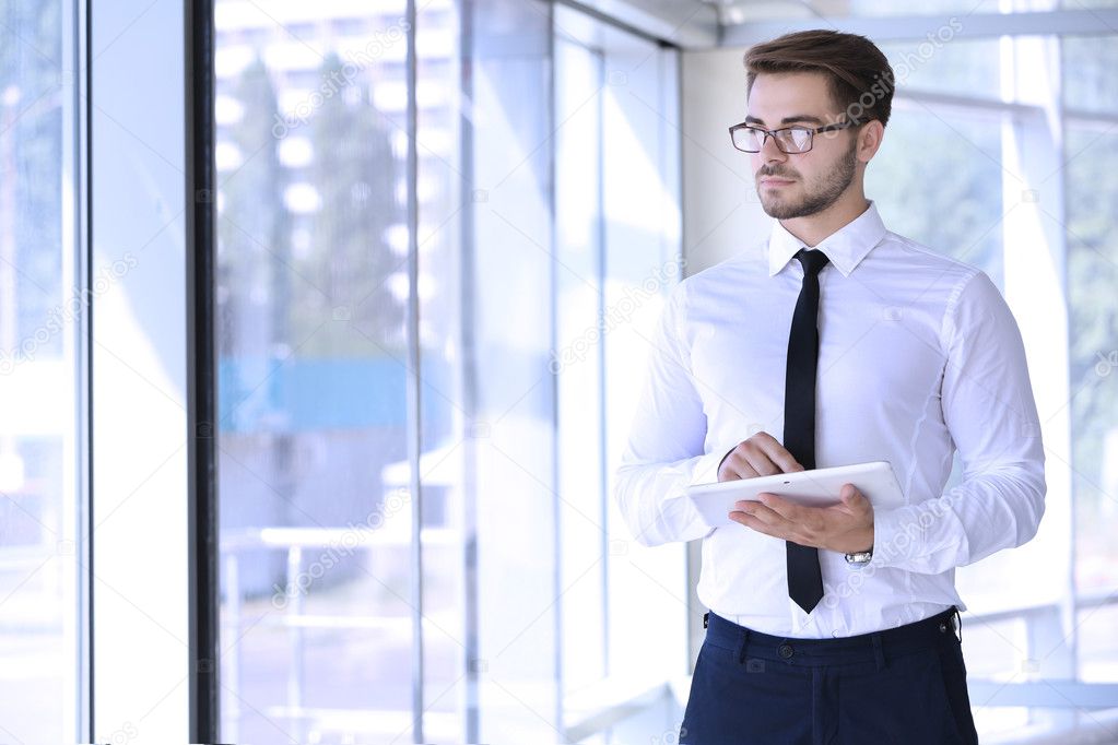 depositphotos_126256554-stock-photo-handsome-young-lawyer.jpg