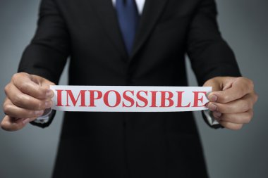 Holding kağıt imkansız kelime ile işadamı
