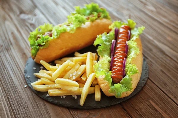 Hot dog and fries — Stock Photo, Image