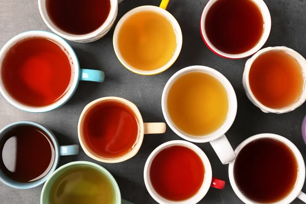 Cups of tea on table, top view — Stock Photo, Image