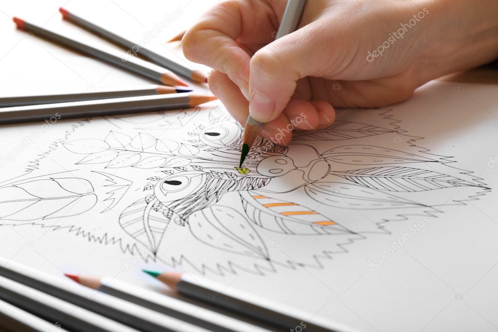 Woman coloring anti stress picture 