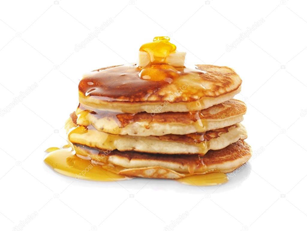 Tasty pancakes with honey and butter, isolated on white