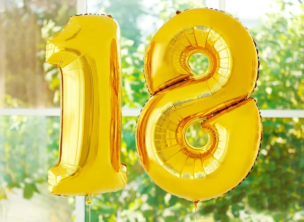 Golden birthday balloons — Stock Photo, Image