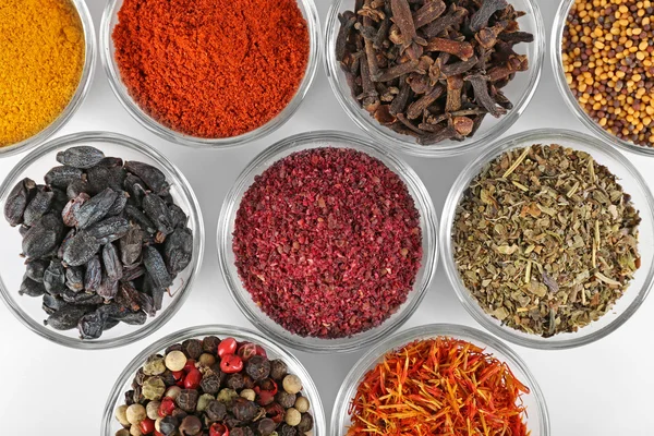 Spices in glass bowls — Stock Photo, Image