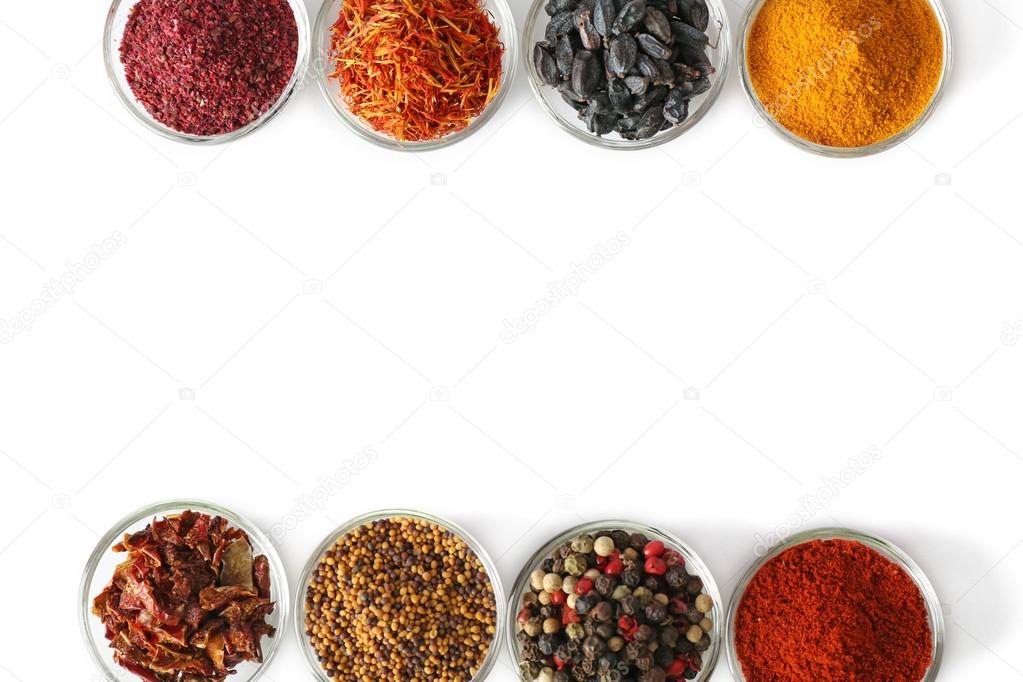 spices in glass bowls 