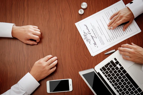 Signing marriage documents in notary public office