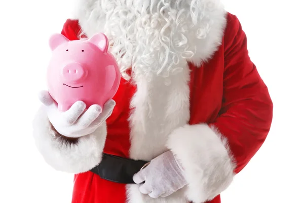 Santa Claus hand holding piggy bank on white background — Stock Photo, Image