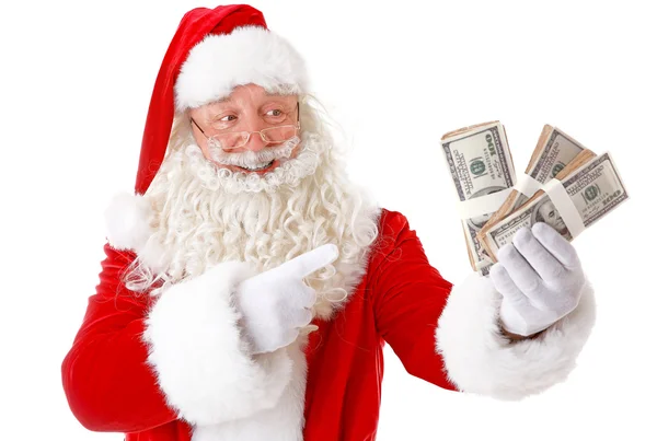 Santa Claus holding money on white background Stock Picture
