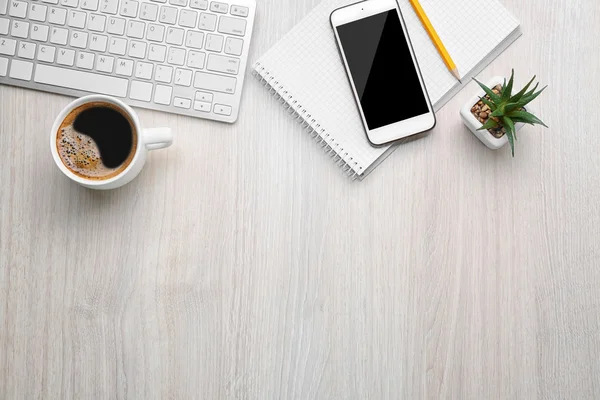 Cup of coffee with office tools — Stock Photo, Image