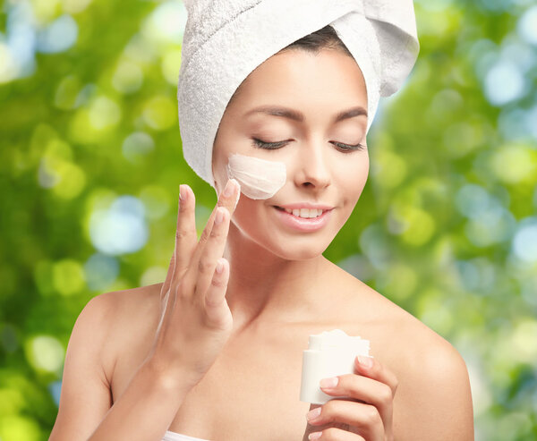 Beautiful girl with cream 