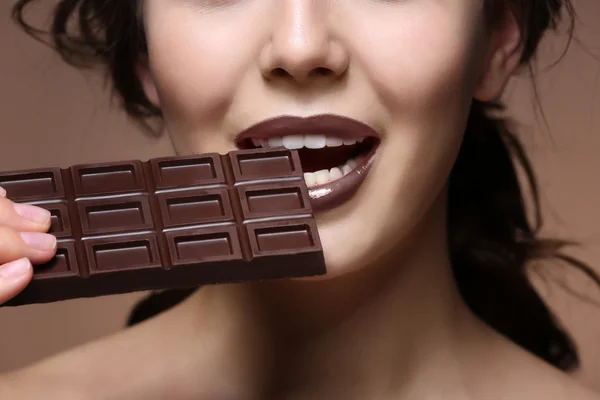 Beautiful girl with chocolate — Stock Photo, Image